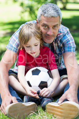 Happy father with his son at the park