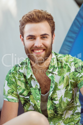 Happy hipster smiling at camera