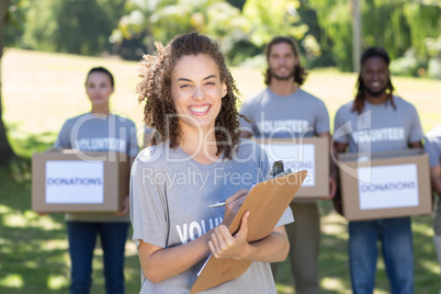 Happy volunteers in the park