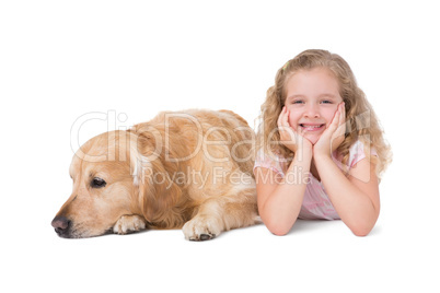 Little girl and dog lying on the floor