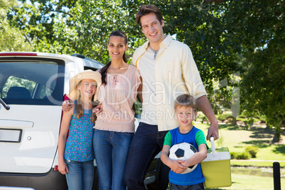 Happy family getting ready for road trip