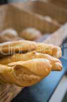Close up of basket with rustic baguettes
