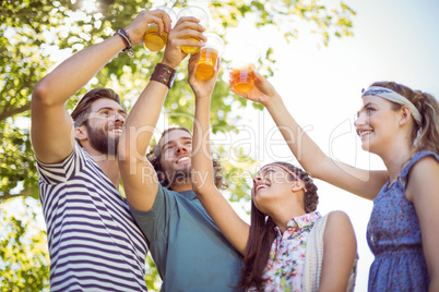Hipster friends having a beer together