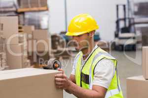 Worker preparing goods for dispatch