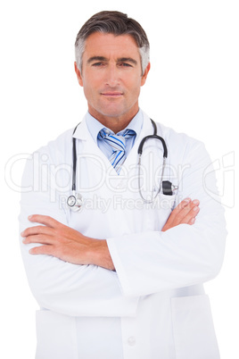 Serious doctor looking at camera