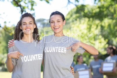 Happy volunteers in the park Happy volunteers in the park