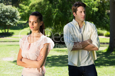 Couple not talking after a dispute in the park