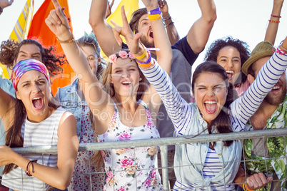 Excited young people singing along