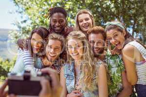 Happy young friends posing together