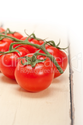 fresh cherry tomatoes on a cluster