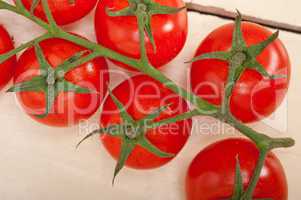 fresh cherry tomatoes on a cluster