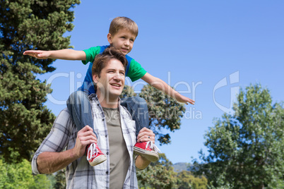 Father and son having fun in the park