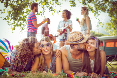 Happy hipster couples on campsite