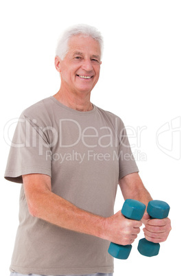 Senior man lifting hand weights