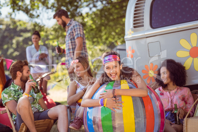 Happy hipsters having fun on campsite