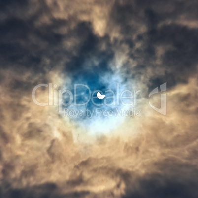 eclipse of the sun in the afternoon clouds Osred 20.032015