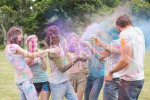 Friends having fun with powder paint