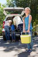 Happy family getting ready for road trip