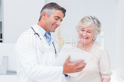 Doctor and patient discussing over reports