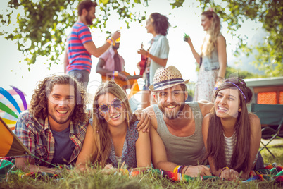 Happy hipsters smiling at camera