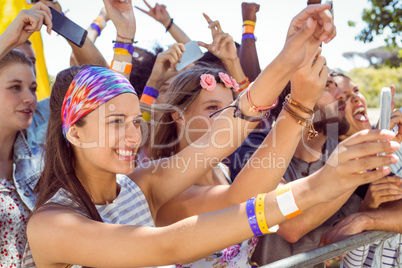 Excited music fans up the front