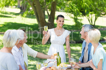 Pretty brunette toasting with her family