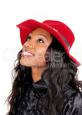 Black woman with red hat.