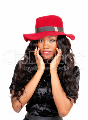 Black woman with red hat.