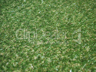 Green artificial synthetic grass meadow background