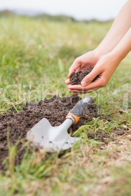 Woman planting in a field