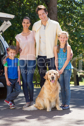 Happy family getting ready for road trip