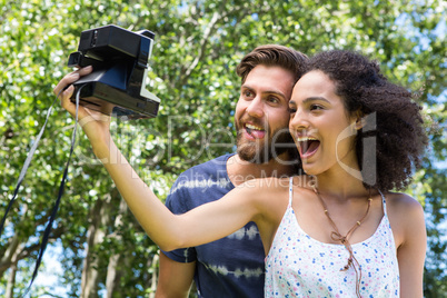 Hipster couple taking a selfie