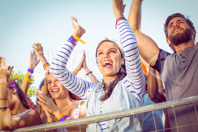 Excited music fans up the front