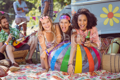 Happy hipsters having fun on campsite