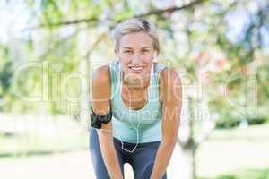 Pretty blonde jogging at the park