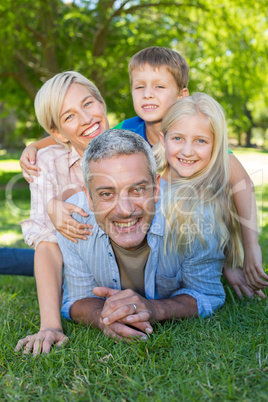 Happy family smiling at the camera