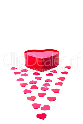 Open gift box with heart-shaped and scattered hearts