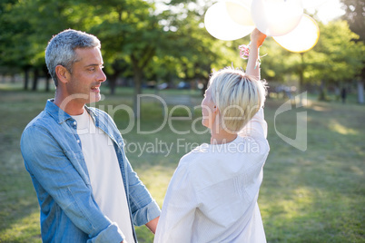 Happy couple having fun at the park