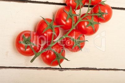 fresh cherry tomatoes on a cluster