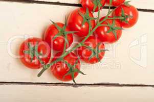 fresh cherry tomatoes on a cluster