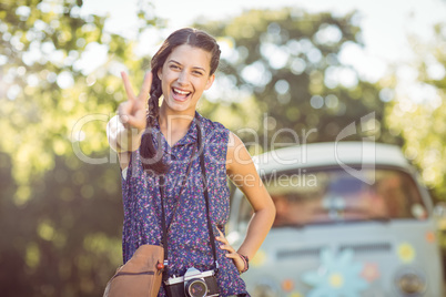 Pretty hipster smiling at camera