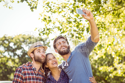 Hipster friends taking a selfie