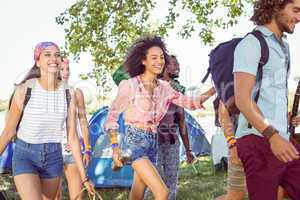 Young friends arriving at their campsite