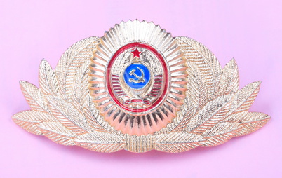 Gold Cockade on Pink Background