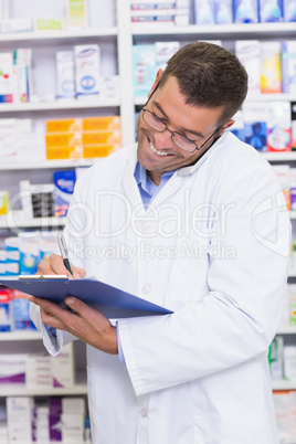 Happy pharmacist on the phone