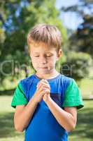 Little boy saying his prayers