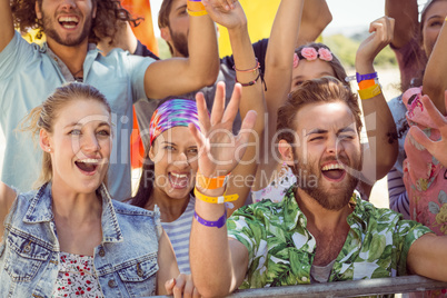 Excited young people singing along