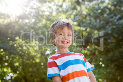 Happy little boy smiling at camera