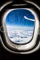 Frost on the Airplane glass window.