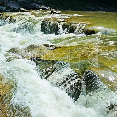 Waterfall on the mountain river